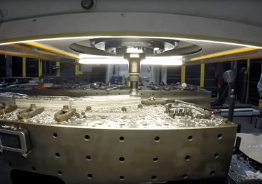 加工3 d印刷在加法制造卓越中心的部分。照片通过ASTM国际