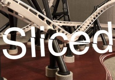 丹Fritsche与切片的功能性发射过山车的标志。