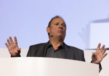 Prof. Dr. Michael Suess addressing the AMTC 2021. Photo via Robert Gongoll/Oerlikon.