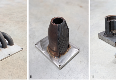 由Meltio制造的示例组件。i)发动机歧管，ii)燃烧室，iii)玻璃模芯。图片来源:Meltio